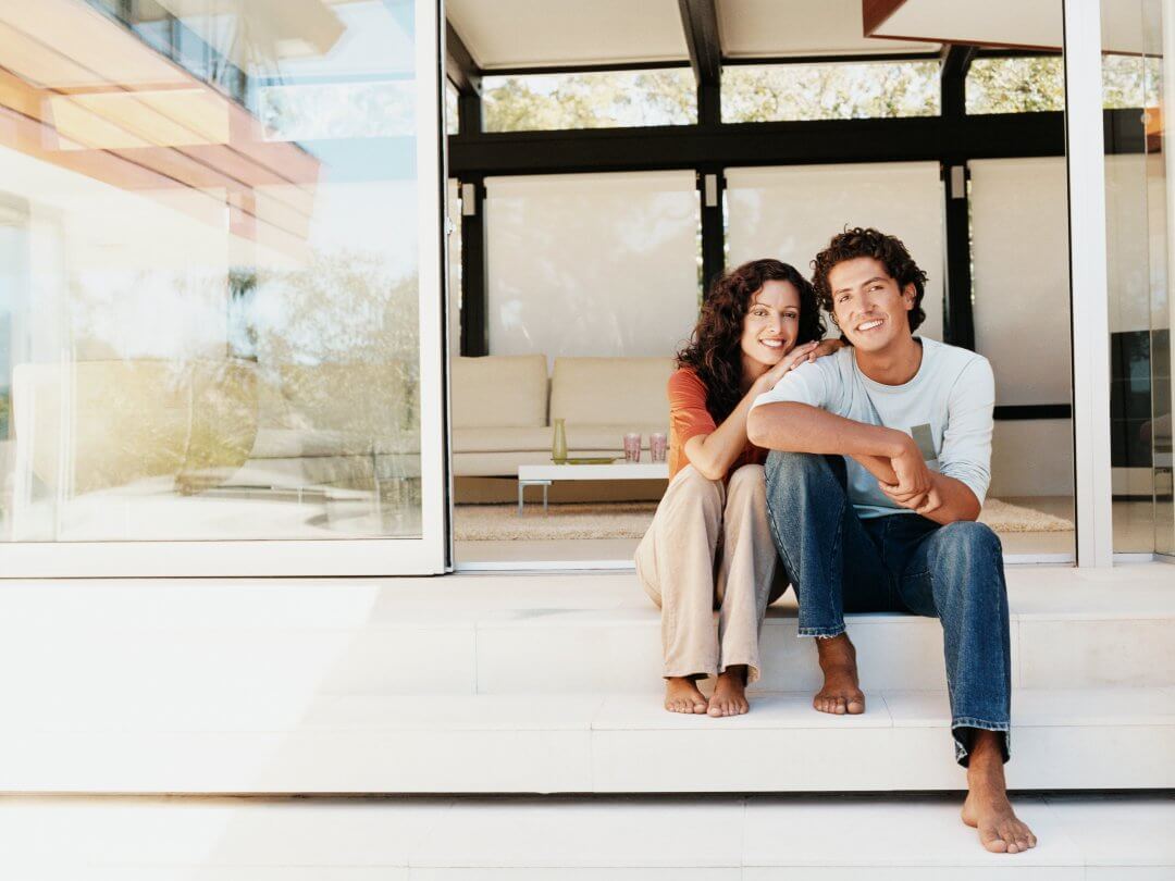 Couple seating near Sliding Patio Doors.